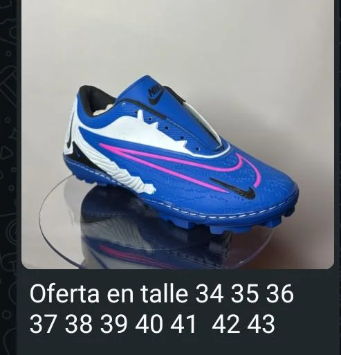 Botines Nike Azules con Detalles Rosa para Césped Sintético